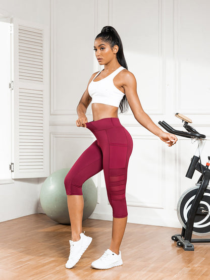 Slim-fit 7/8-length pants with mesh pockets for running, fitness, yoga, and casual wear