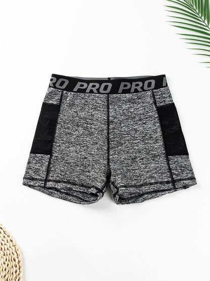 Women's High-Waisted Butt-Lifting Yoga Pants with Mesh Pockets and Three-Quarter Length for Running and Fitness