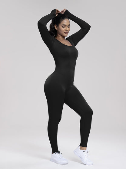 Person wearing a black bodysuit on a white background