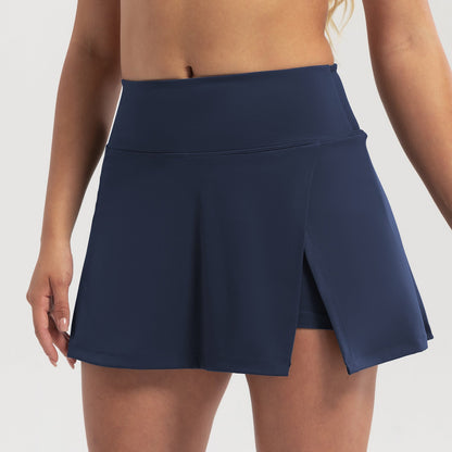 Navy blue skirt worn by a person on a white background